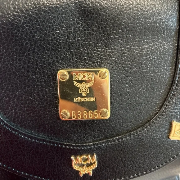 MCM Black Leather Backpack with Gold Accents - Picture 5 of 11